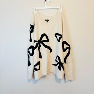 Express Cream Knit Sweater with sparkle black bow details